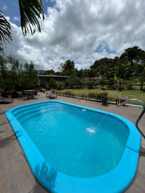 Suíte em uma reserva ambiental com piscina
